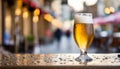 Close-up of glass of cold beer glass with foam on table. Cool beverage. Alcoholic drink