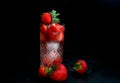 Close up a glass of fresh Strawberry Cocktail mojito soda on dark background, copy space Royalty Free Stock Photo