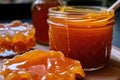 close-up of a glass jar with fermenting kombucha and scoby