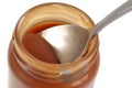 Spoon in a pot of salted butter caramel Royalty Free Stock Photo