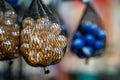Close up of glass marbles in mesh bags Royalty Free Stock Photo