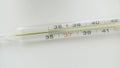 A close-up of a glass mercury thermometer shows a low temperature Royalty Free Stock Photo