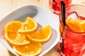 Close-up of glass of spritz aperitif aperol cocktail with orange slices and ice cubes