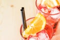 Close-up of glass of spritz aperitif aperol cocktail with orange slices and ice cubes