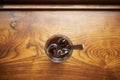 Close-up of glass of Vietnamese iced coffee on wooden table