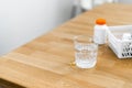 Close up glass with water and sparkling pill. Magnesium anti-stress, painkiller or orange drink Royalty Free Stock Photo