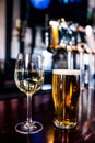 Close up of a glass of wine and a beer Royalty Free Stock Photo