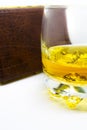 A close-up of a glass of wiskey isolated on a white background