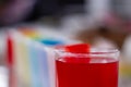 Close-Up Of Glasses Full Of Coloured Liquid