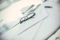 Close up. glasses and pen on the therapist`s Desk Royalty Free Stock Photo