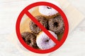 Close up of glazed donuts pile behind no symbol Royalty Free Stock Photo