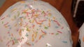 Close-up of glazed easter cakes. Stock footage. Traditional easter cakes covered with white sugar glaze and decorated