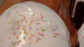 Close-up of glazed easter cakes. Stock footage. Traditional easter cakes covered with white sugar glaze and decorated