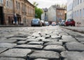 Close-up of glistening paving stones on an ancient street