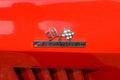 Close-up of a glossy red Chevrolet Corvette car in Manchester, the United States Royalty Free Stock Photo
