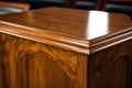 close-up of a glossy wooden pulpit with bible