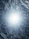 Close-up of a Glowing Blue and White Circuit Board with Intricate Pathways technology electronics Royalty Free Stock Photo