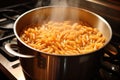 close-up of gluten-free pasta boiling in a pot