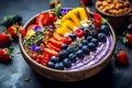 Close-up gluten-free rainbow-hued smoothie bowl with edible flowers and superfoods for a vibrant breakfast