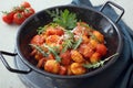 Gnocchi with tomato rocket and cheese