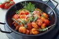 Gnocchi with tomato rocket and cheese