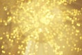 Gold bokeh sparkle glitter from light bulb abstract patterns for Christmas and Happy new year background Royalty Free Stock Photo