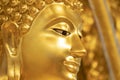 Close up gold Buddha statue FACE for background Royalty Free Stock Photo