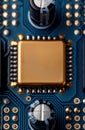 close-up of a gold computer processor on a blue circuit board