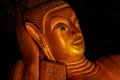 Close up gold reclining Buddha statue hall of cape in Phang-Nga Thailand Royalty Free Stock Photo