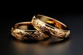 Close up gold wedding rings with small diamonds