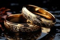 Close up gold wedding rings with small diamonds