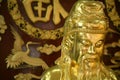 Close-up of golden chinese sculpture in temple