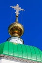 Close-up of golden cross on dome of orthodox church Royalty Free Stock Photo