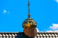 Close-up of golden cross on dome of orthodox church Royalty Free Stock Photo