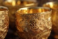 close-up of golden cups intricate details