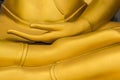 Close up golden hand of buddha statue Royalty Free Stock Photo