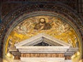 Close-up on golden mosaic decorating dome interior catholic church in Rome