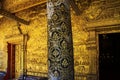 Close up of golden ornamented temple wall - Wat Xieng Thong, Luang Prabang Royalty Free Stock Photo