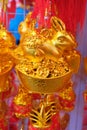 Close-up of a Golden Rabbit trinket, with the Chinese character \'Fortune\' for sale at a Lunar New Year bazaar 2023