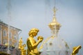 Close up of golden statue of Grand Cascade Fountains in Peterhof Palace in Saint Petersburg, Russia.