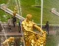 Saint Petersburg, Russia - 18 Sep, 2017: Golden Statue of man wrestling with a lion.