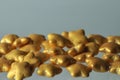 Close-up of golden sugar sprinkles in star shape Royalty Free Stock Photo