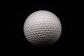 Close-Up of a Golf Ball Against Black Background