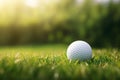 Close-up Golf Ball on Tee with Serene Green Bokeh Background, Perfect Shot on the Golf Course Royalty Free Stock Photo