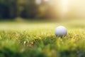 Close-up Golf Ball on Tee with Serene Green Bokeh Background, Perfect Shot on the Golf Course Royalty Free Stock Photo