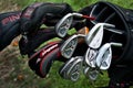 A close up of golf clubs