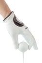 Close up the golfer hand in glove holding the golf ball with tee