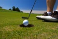 Close up of golfer teeing off Royalty Free Stock Photo