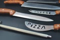 Close up of good set of kitchen knives for slicing. Set of steel kitchen knives Royalty Free Stock Photo