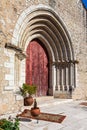 Close up on the Gothic portal of the medieval church of Santa Cruz.